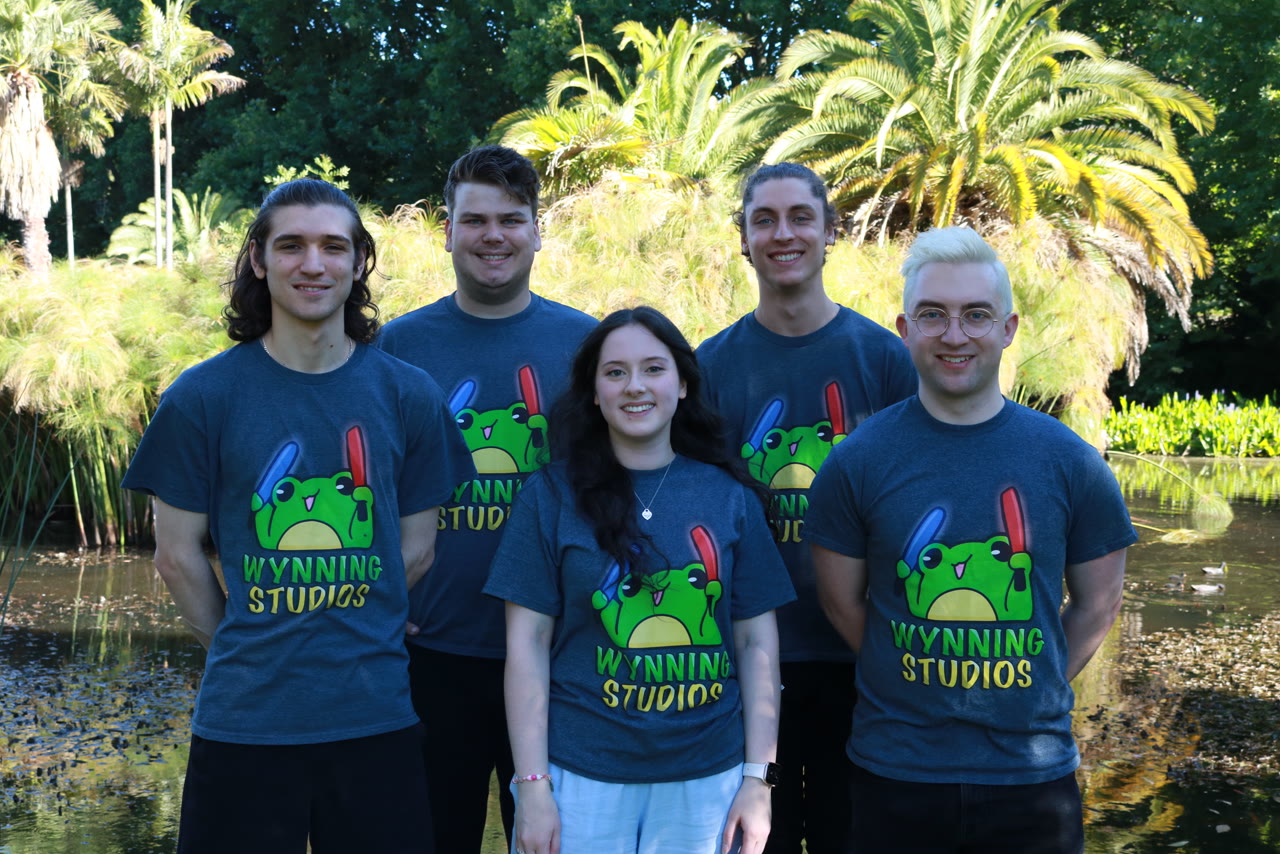 The Wynning Studios developers in the branded frog tee